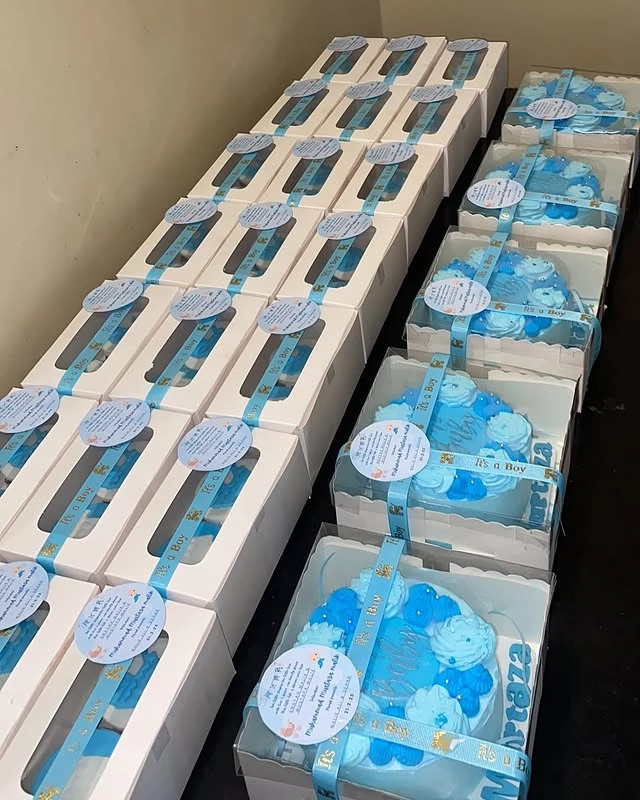 Custom bulk order cake collection with 'It's a Boy' and 'It's a Girl' designs for newborn celebration - Baby Shower Cakes Karachi By Whisk And Sift